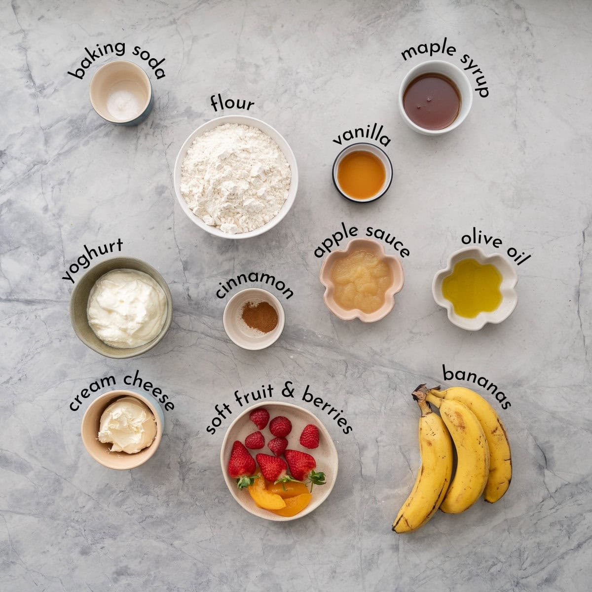 The ingredients for a banana based smash cake laid out on a counter top with text overlay.