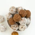 Bowl of bliss balls stacked on one another.