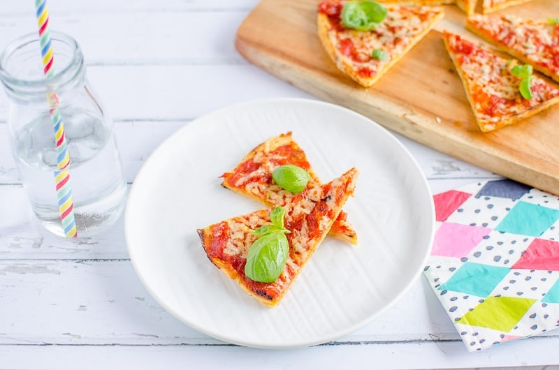 Two slices of pizza on a plate