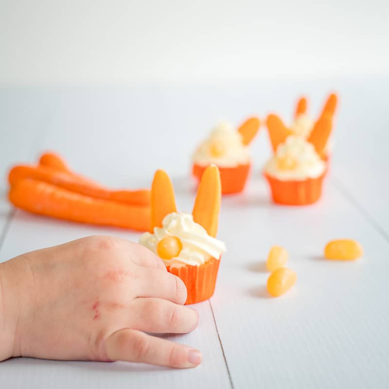 Easter Bunny Carrot Cupcakes are a fun easter treat for kids, as well as a brilliantly simple kitchen project to get kids baking in the kitchen this Easter!