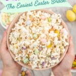 6 pastal coloured tall bowls filled with easter popcorn on benchtop.