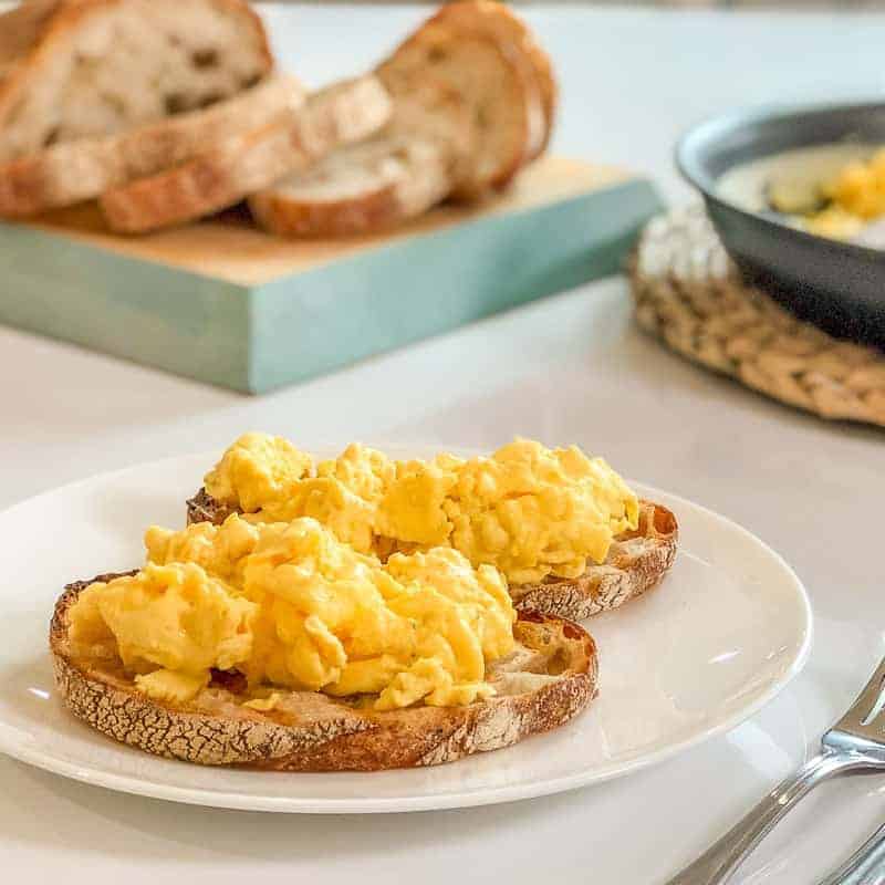 Easy cheesy scrambled eggs recipe uses your blender to make the best fluffy scrambled eggs