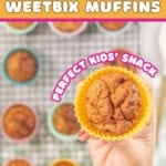 A muffin being held up with text overlay; Healthy Weetbix muffins, perfect kids' snack.