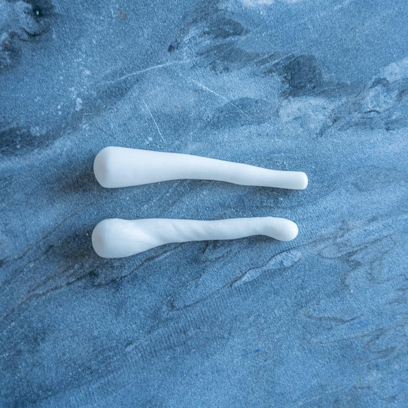 Fondant rolled into long unicorn shaped horns.