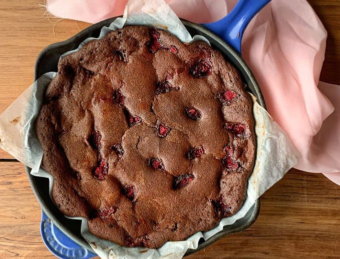 Raspberry skillet brownie in pan.