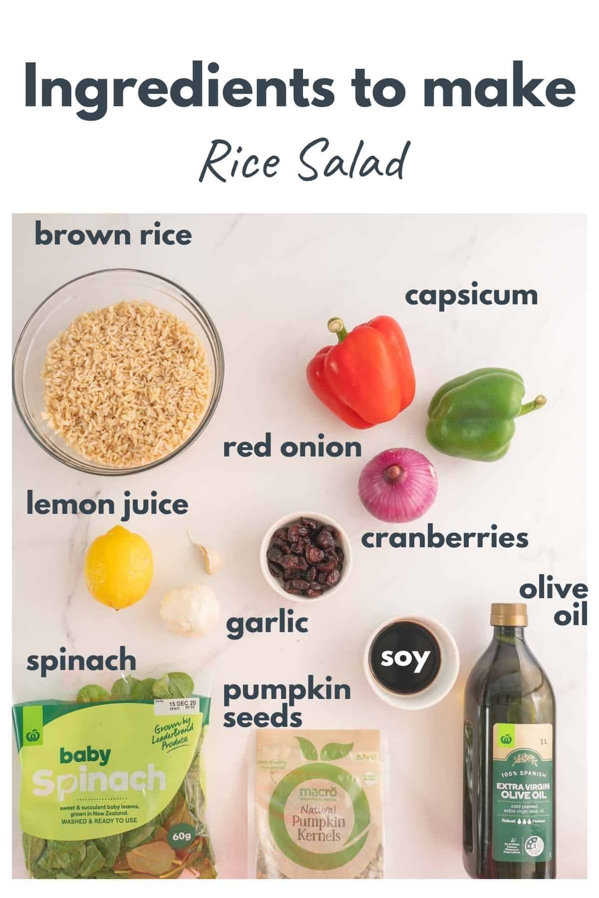 Ingredients to make a Christmas rice salad laid out on a bench top with text overlay.