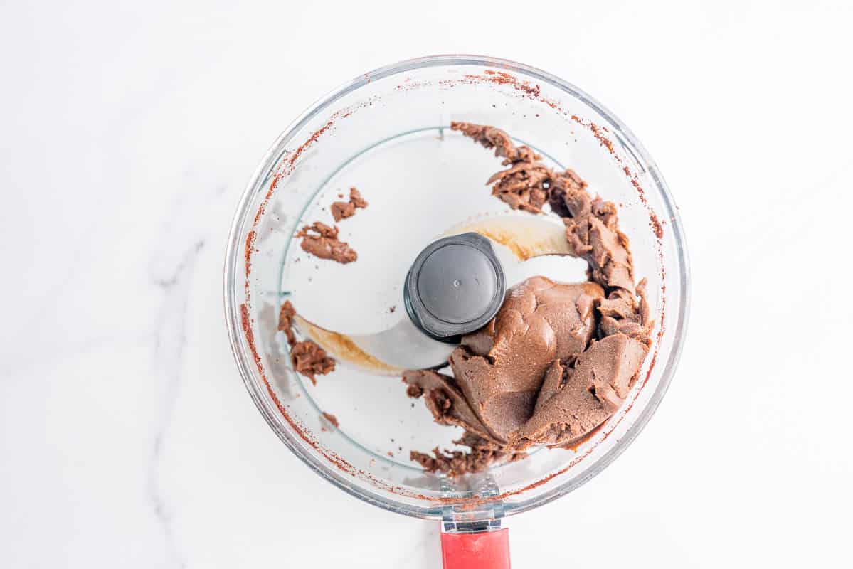 Chocolate dough ball in a food processor.