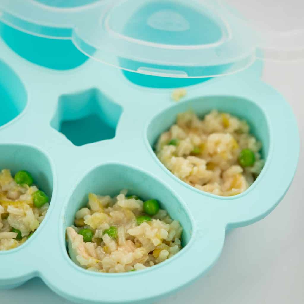 chicken and leek risotto in a blue silicone baby freezer tray