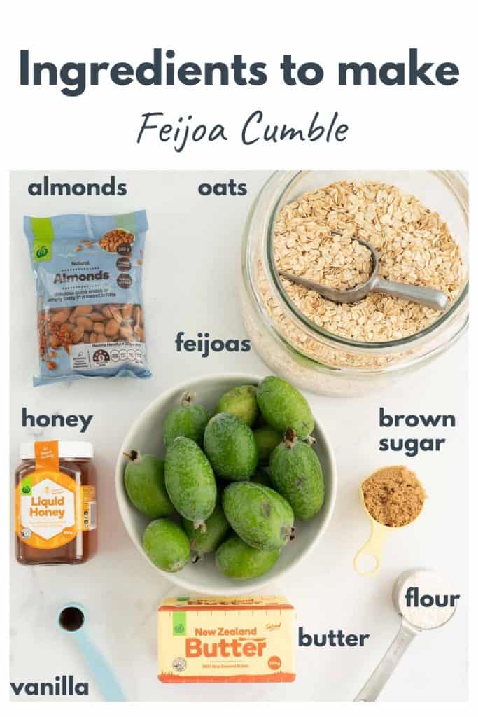The ingredients to make feijoa crumble laid out on a bench top with text overlay.
