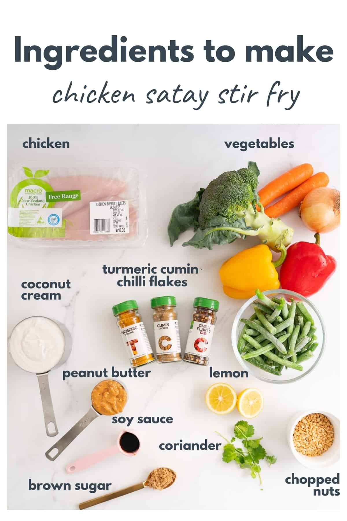 chicken satay stir fry ingredients laid out on a bench top with text over lay.