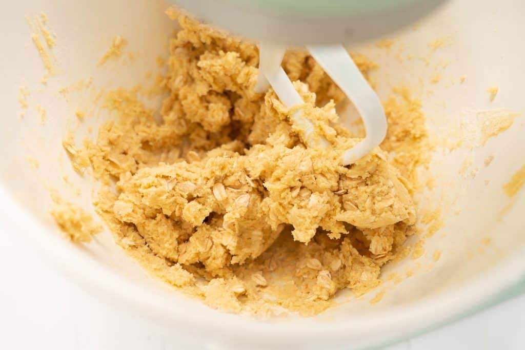 Cookie dough mixed with a stand mixer.
