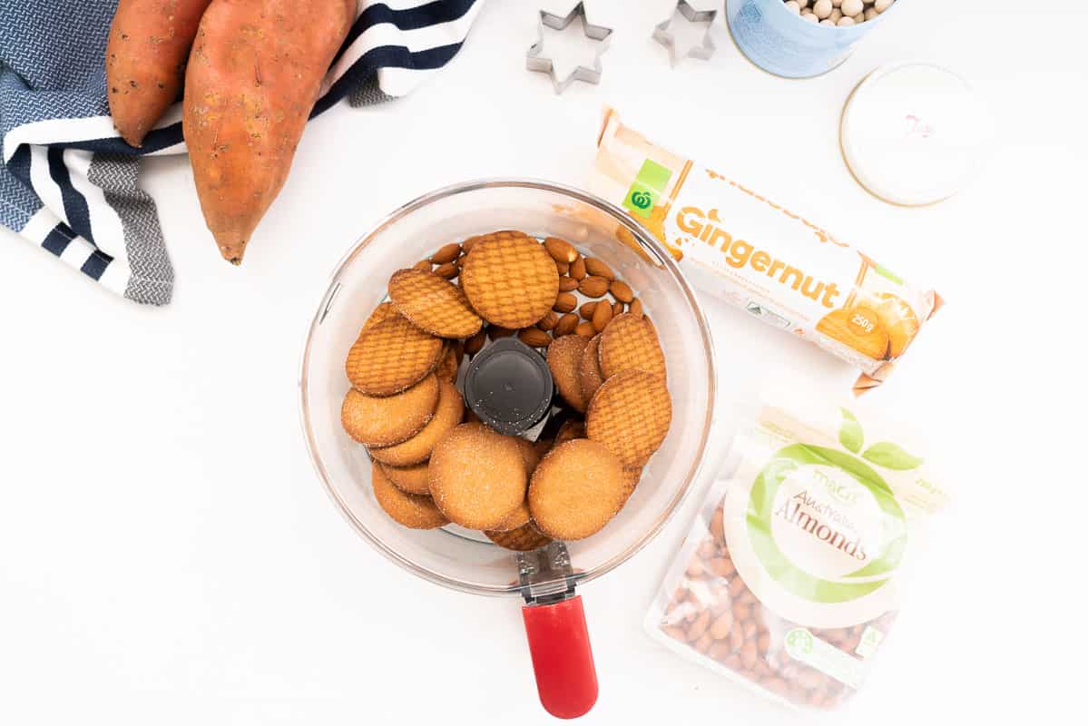 gingernut biscuits and almonds in a food processor
