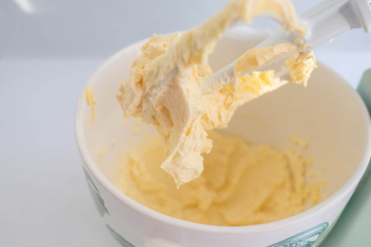 Creamed butter and sugar in the bowl of a stand mixer.