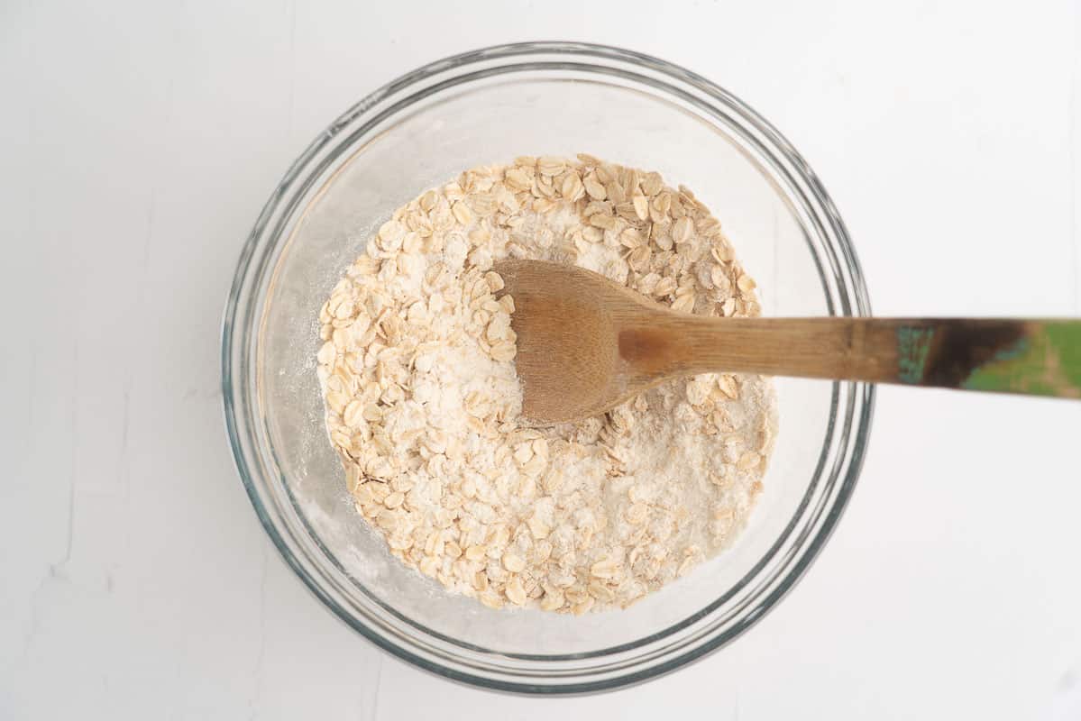 A glass mixing bowl and filled with dry ingredients.