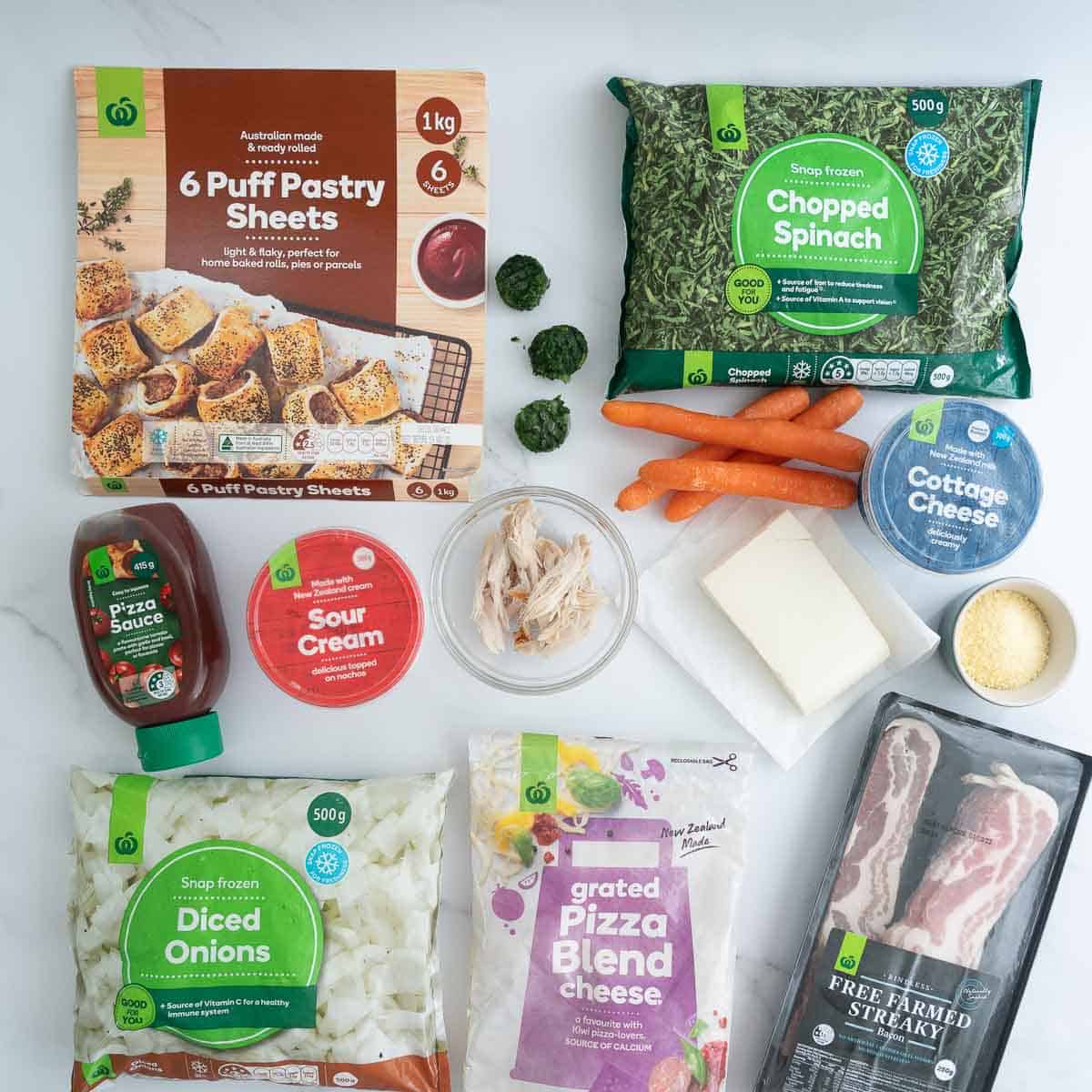 A collection of ingredients that can be used to make easy pizza scrolls.