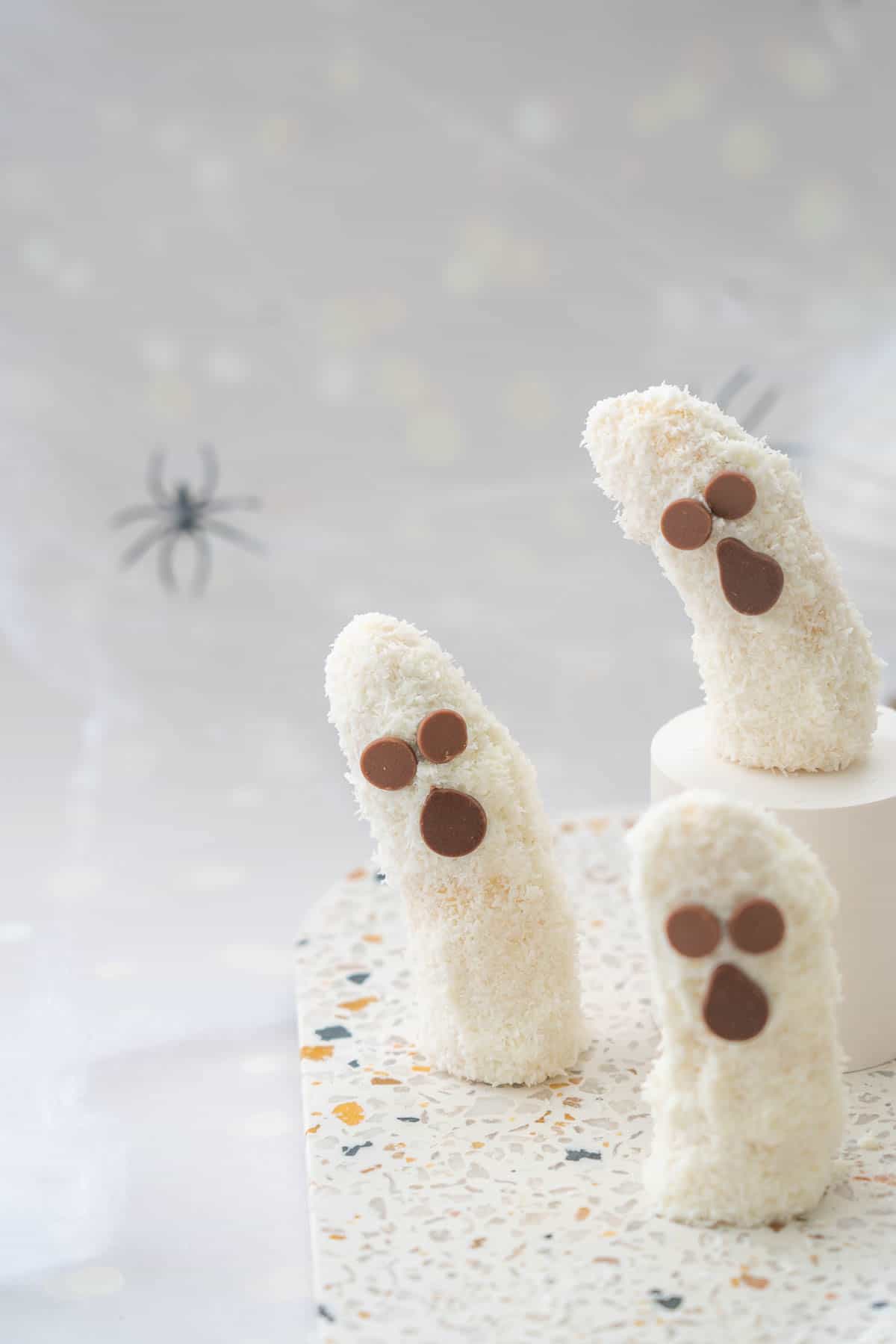 Three ghost bananas served on a platter.