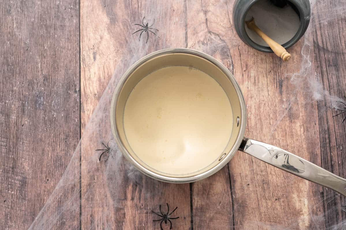 Cream in a saucepan.