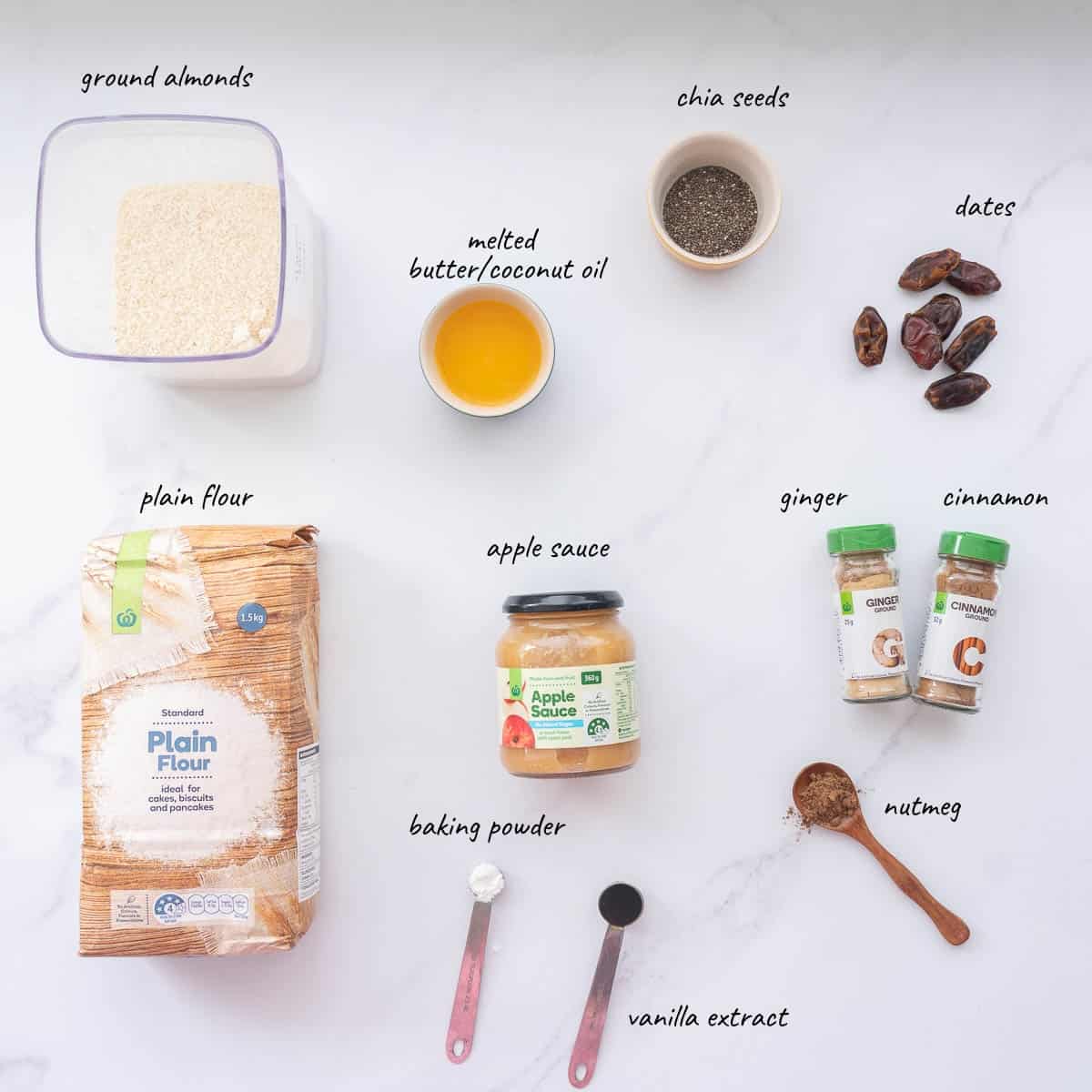 The ingredients to make low-sugar christmas cookies laid out on a bench.