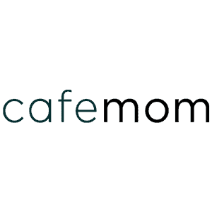 Tuna rice balls packed into a small pink bento box with cookies and vegetables.