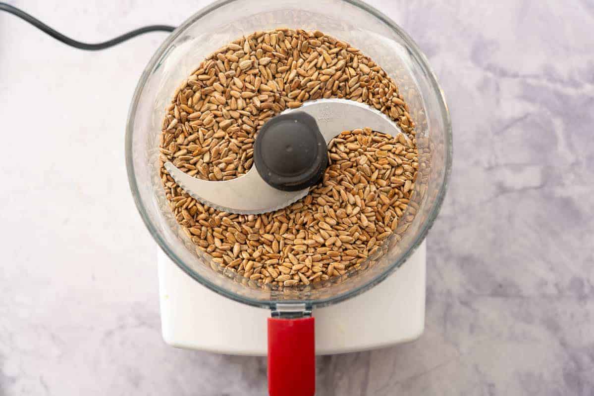 Looking into the mixer filled with roasted sunflower seeds