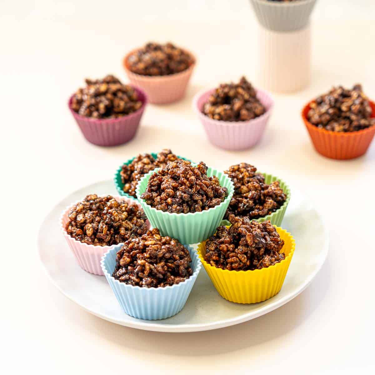 Chocolate rice krispie treats on a white platter