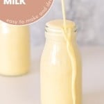 Banana milk being poured into a small glass bottle until it overflows, with text overlay for pinterest.