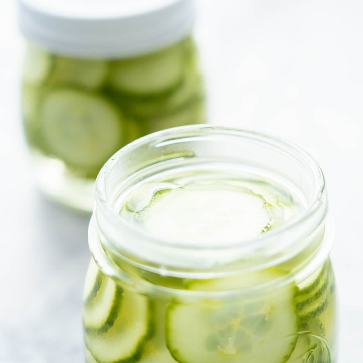 Jar of pickled cucumbers.