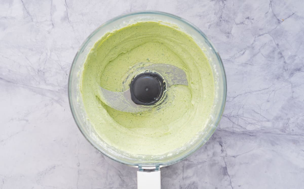 All the ingredients whizzed up in the food proccessor to make a smooth dip which is sitting on the bench