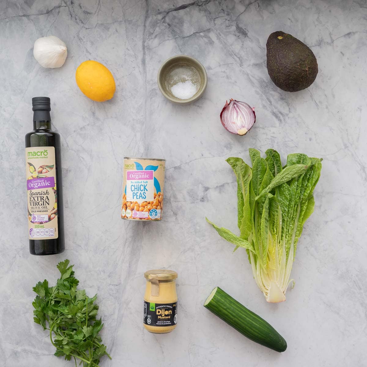 Ingredients for Chickpea Avocado salad laid out on bench top.