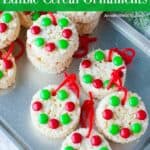 Five cereal ornements on a tray decorated with green and white Christmas's m&ms.