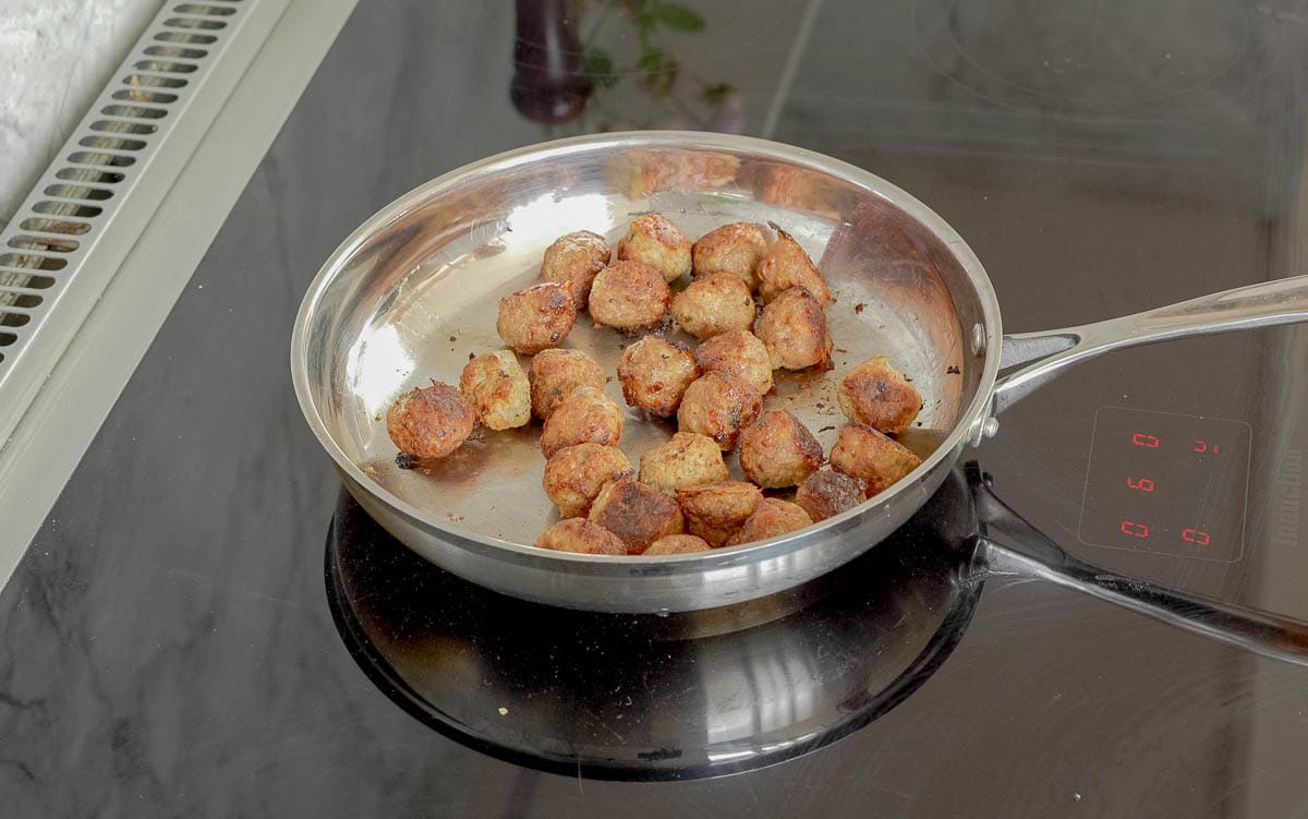 Meatballs in frying pan.
