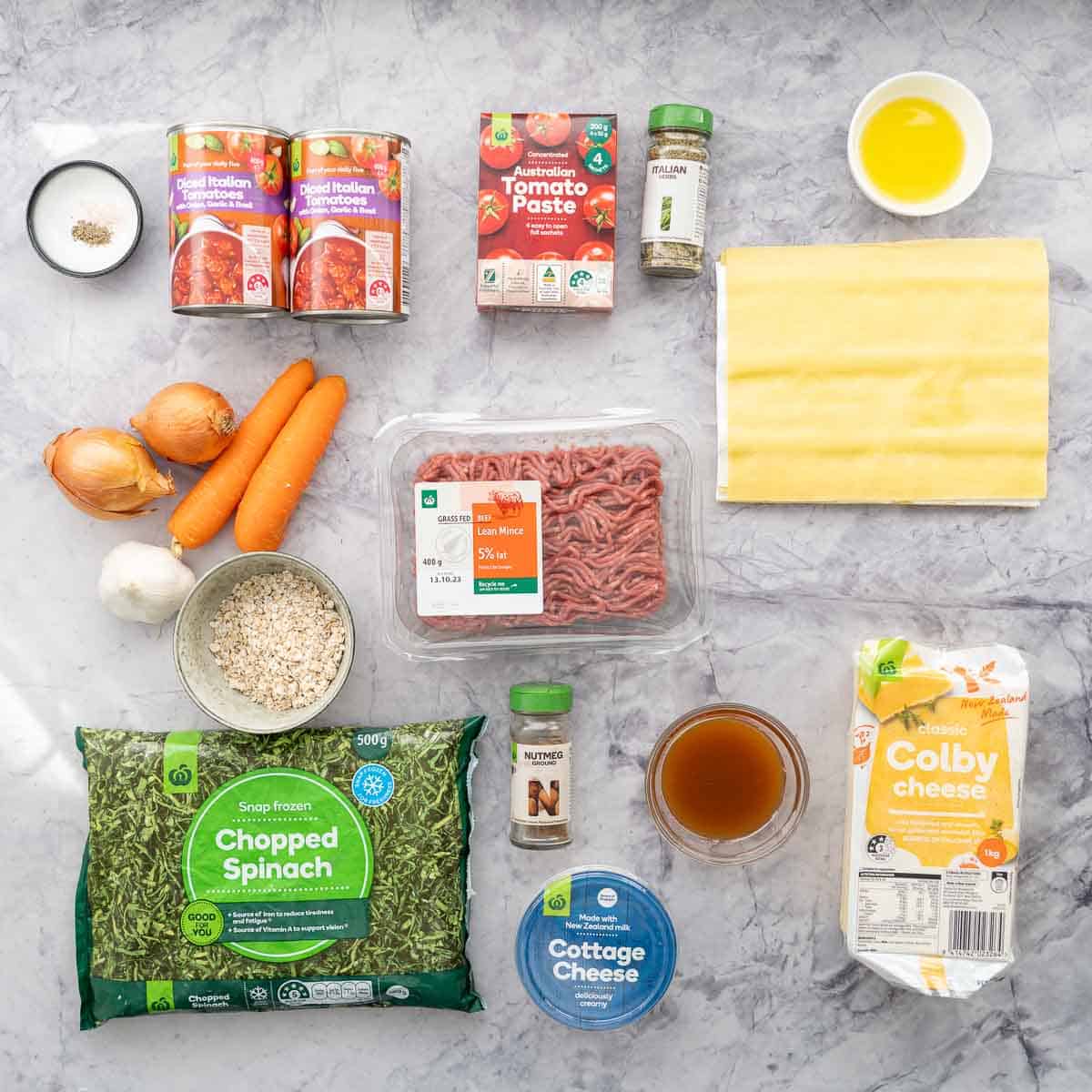 All the ingredients to make the Lasagna Rolls Ups laid out on the bench