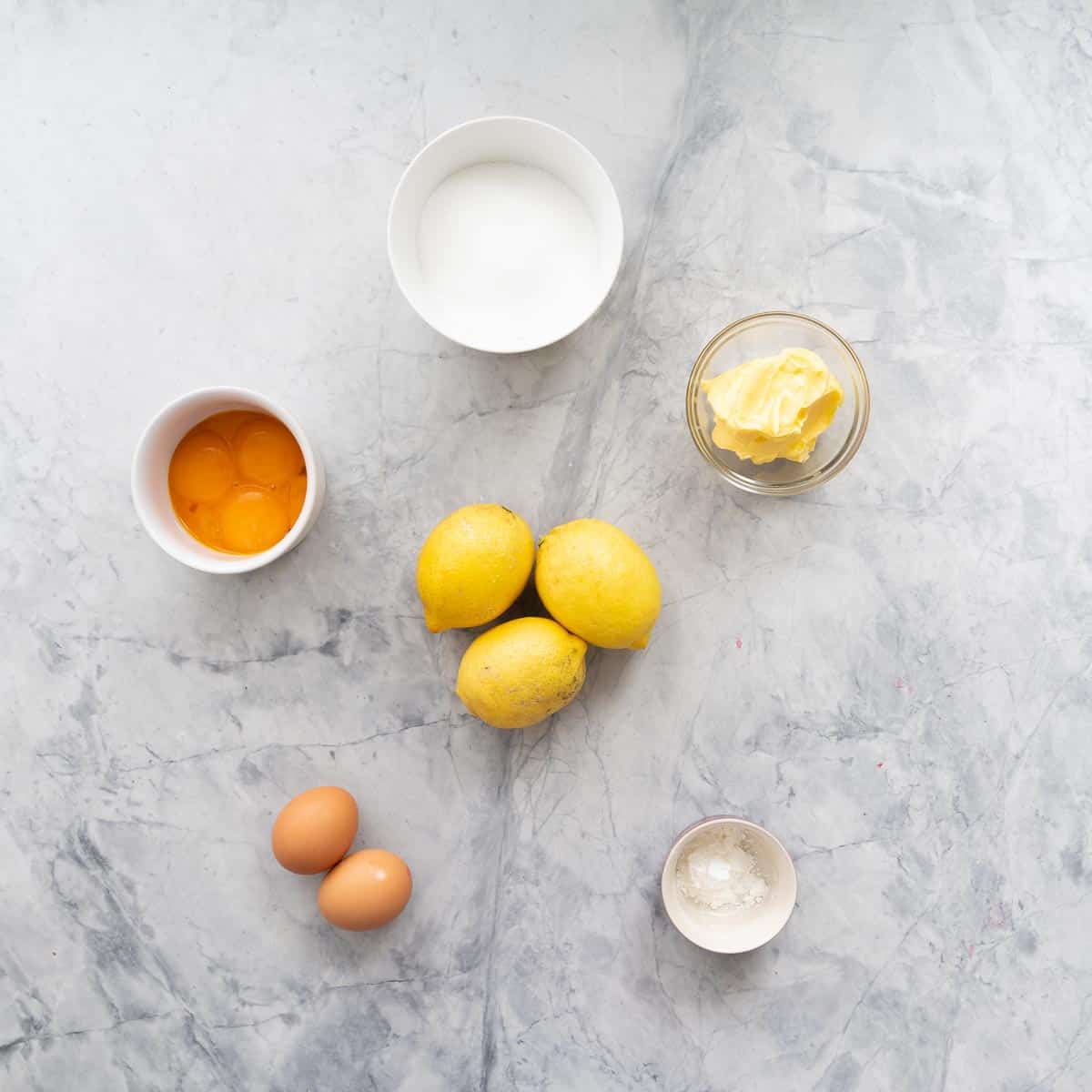 All the ingredients to make the Lemon Butter laid out on the bench