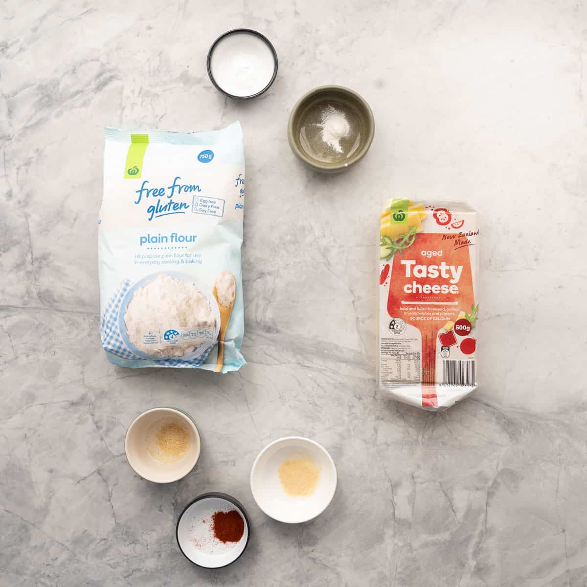 All the ingredients to make the cheese crackers resting on the bench