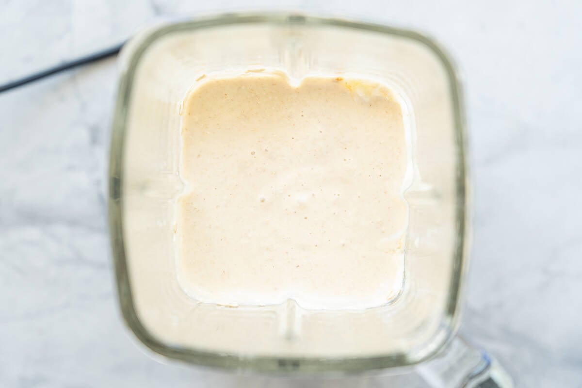 Mixture for banana blueberry oatmeal muffins blended until smooth in blender. 