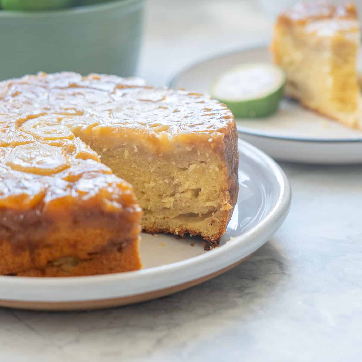 A feijoa cake with a slice removed.