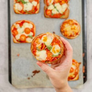 A round piece of toast topped and cooked like pizza!