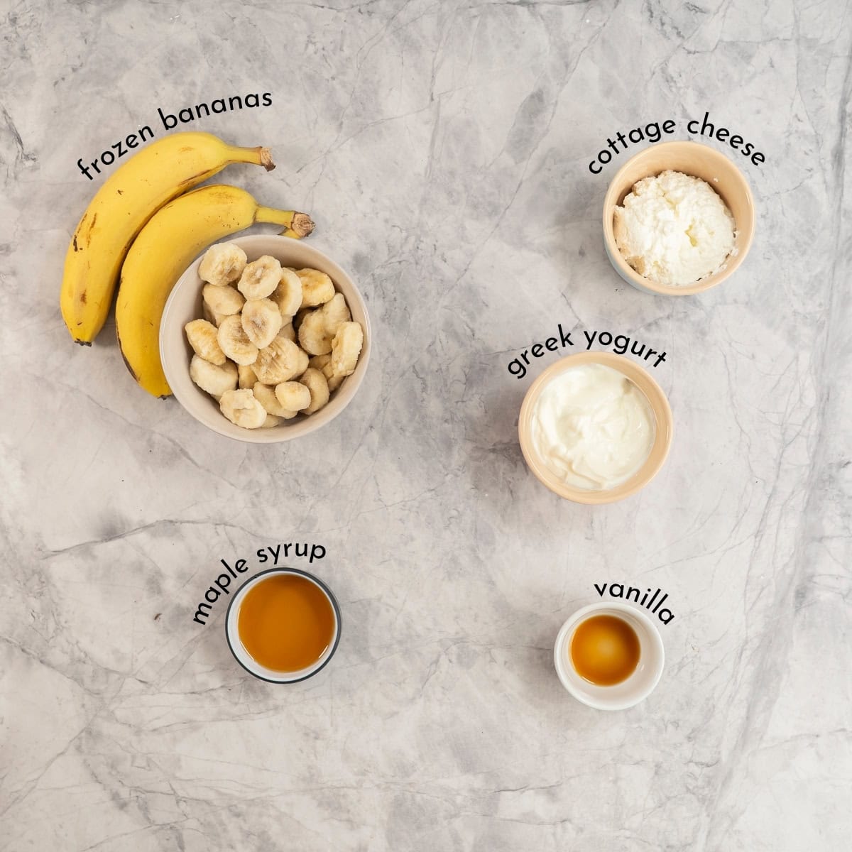 Ingredients for healthy banana pudding on benchtop with text overlay.
