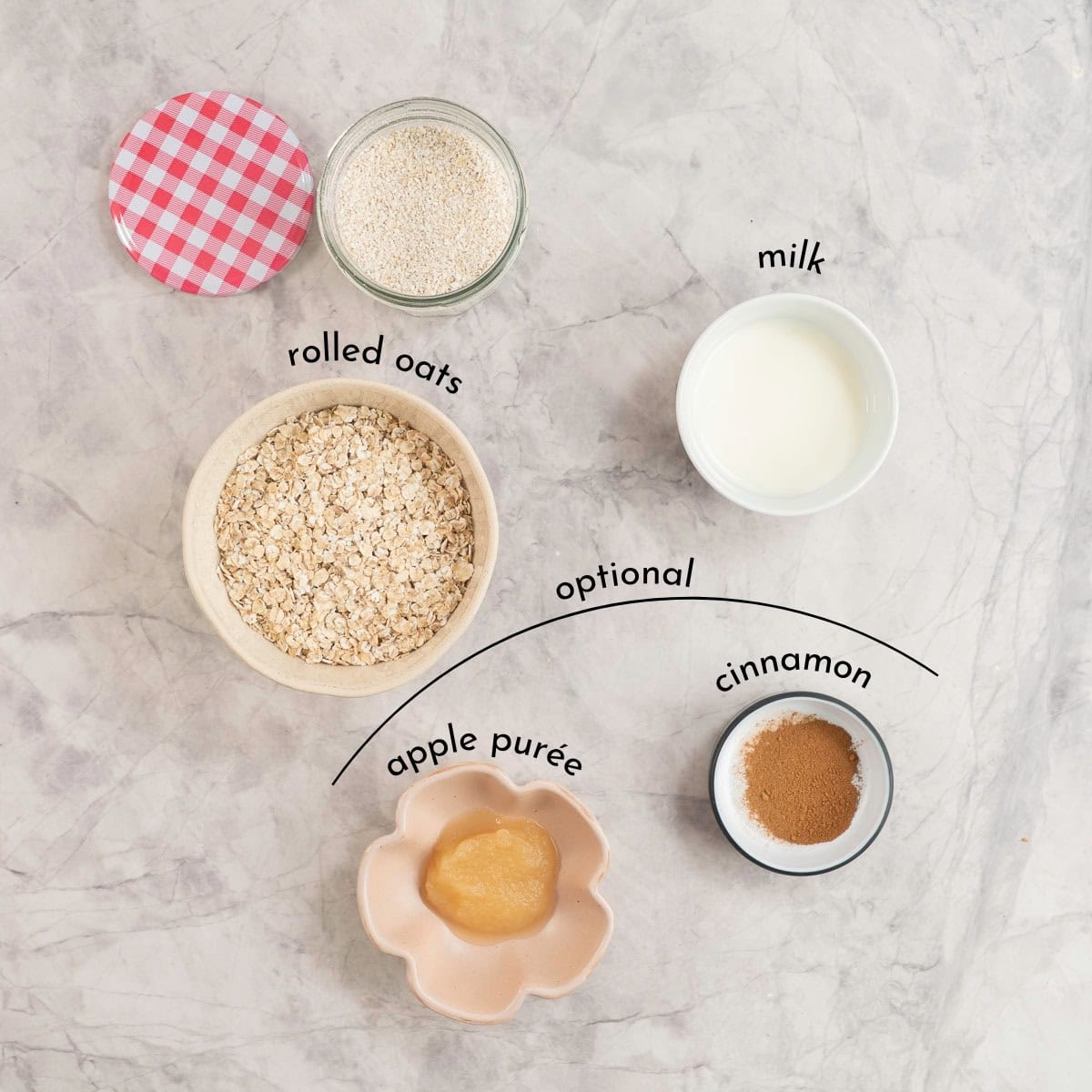 Ingredients for baby oats on bench top with text overlay.