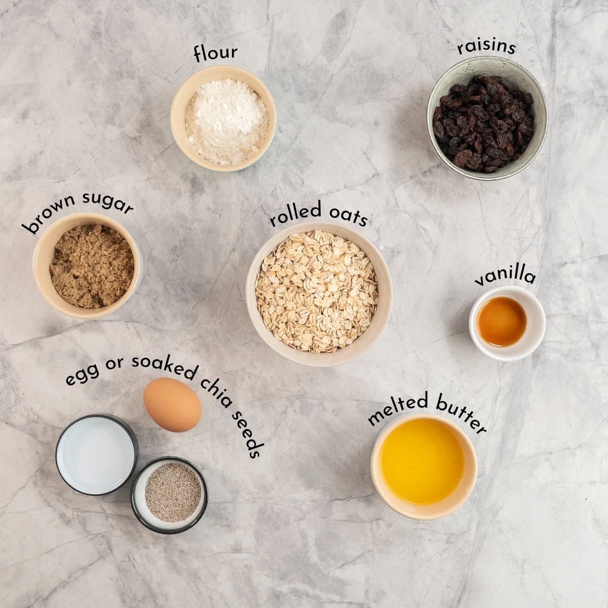 Ingredients for oat slice on benchtop with text overlay.