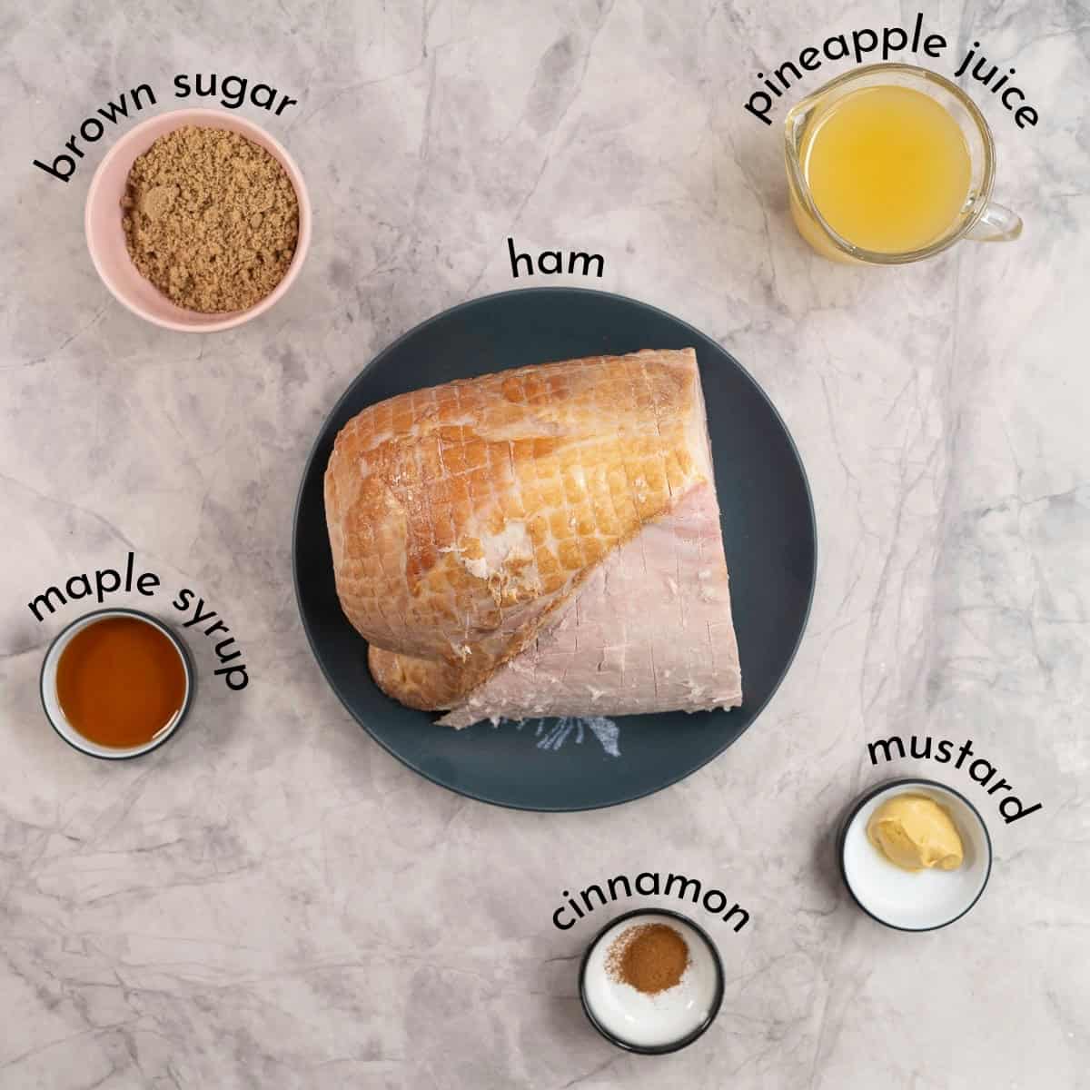 Ingredients for ham on marble benchtop with text overlay.